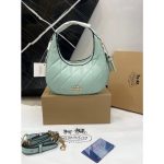 COACH QUILTED MINI CROSS BODY BAG