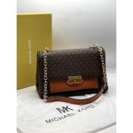 Signature Logo Aesthetic: Crafted from premium 89.4% Coated Canvas, offering a durable and recognizable luxury finish that maintains its shape. Versatile Sliding Strap: Features an adjustable strap (11.25"-19.75"), allowing you to wear it as a long crossbody or a doubled-up shoulder bag. Optimized Organization: Stay perfectly arranged with a back exterior slip pocket for your phone and a front interior zip pocket for valuables. Premium Push-Lock Hardware: Equipped with a functional and stylish gold-tone fastening for quick access and maximum security. Full Boutique Experience: Your purchase comes with the Signature Brand Box and a Premium Dust Bag, ensuring a complete and high-end unboxing experience.