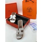 HERMES H CUT OUT ORAN WHITE SLIPPERS