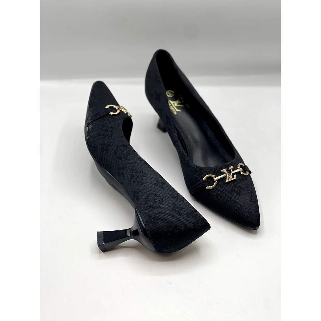 lv black logo emobosed heel 2 LOUIS VUITTON MONOGRAM PATTERN BLACK PUMPS